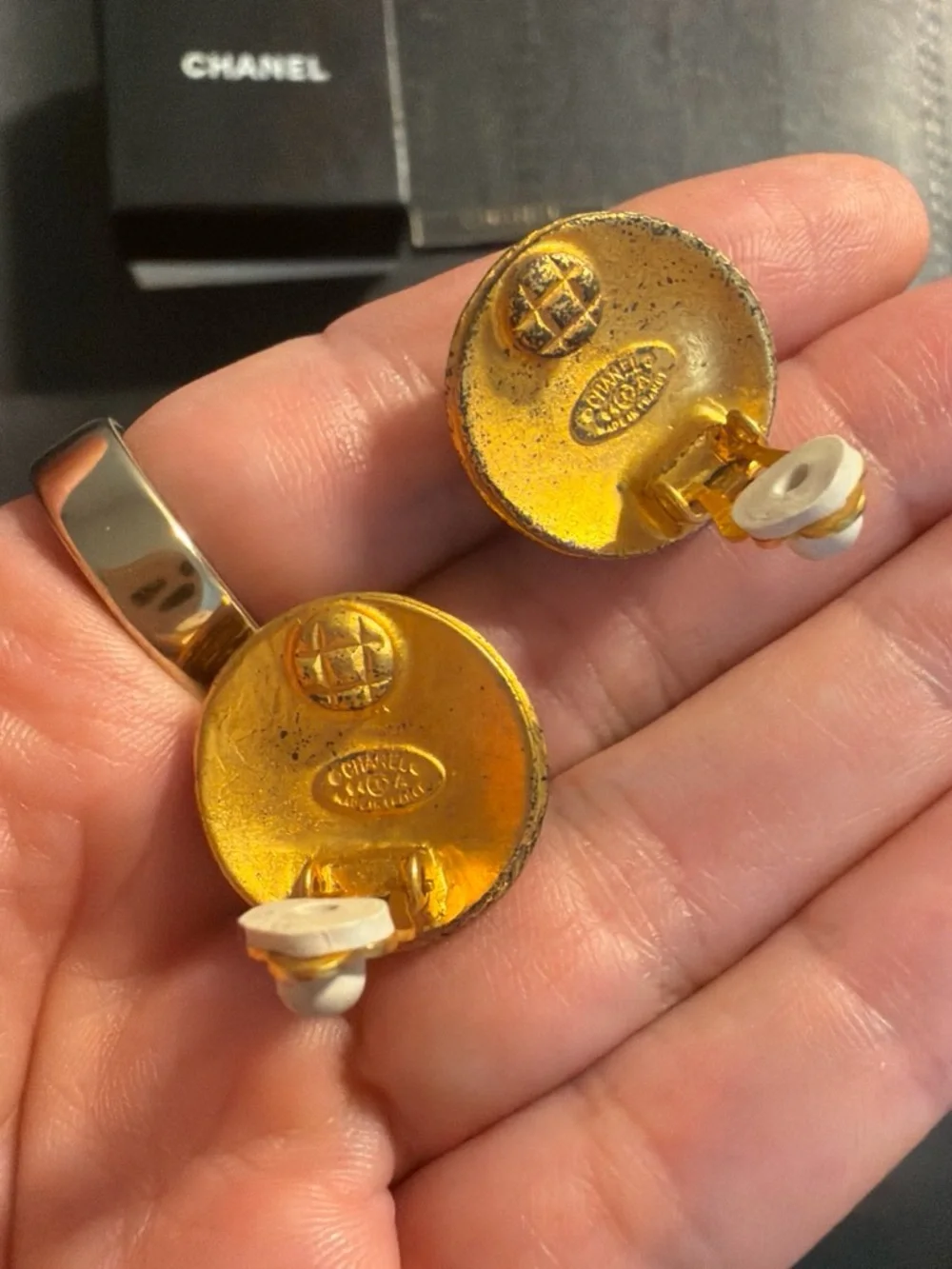 CHANEL Gold Tone Embossed Logo Cuff Links